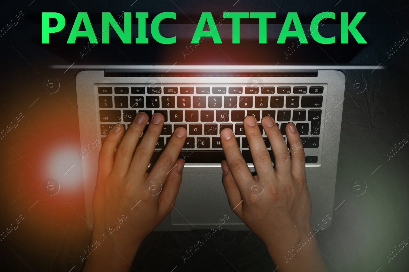 Image of Man working with laptop, top view. Use information safely to avoid panic attack