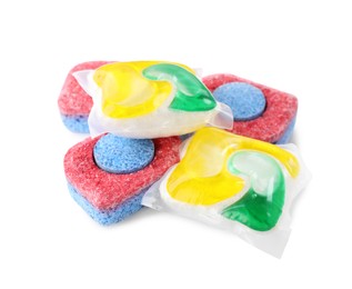 Photo of Dishwasher detergent pods and tablets on white background