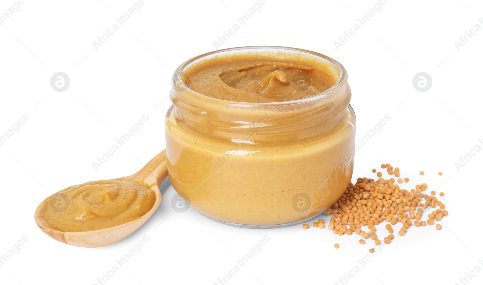 Photo of Fresh tasty mustard sauce in jar, spoon and dry seeds isolated on white