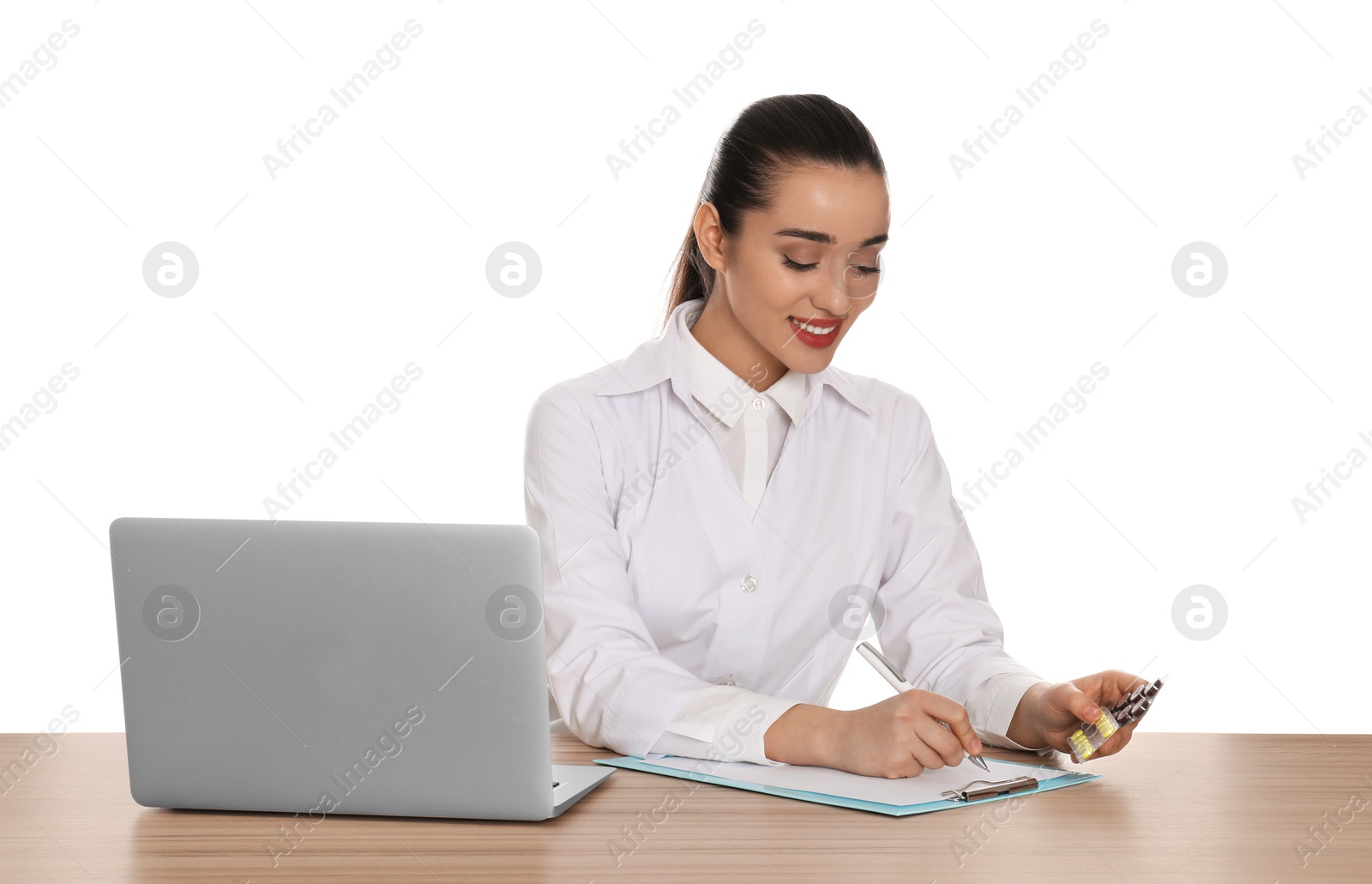 Photo of Professional pharmacist working at table against white background