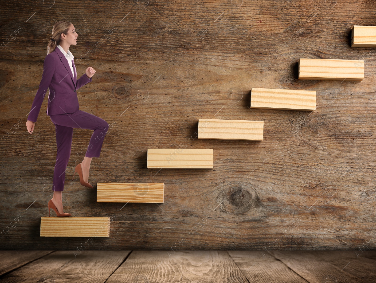 Image of Businesswoman walking up stairs against wooden background. Career ladder concept