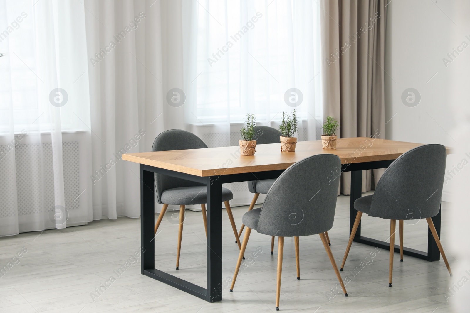 Photo of Modern room interior with chairs and table