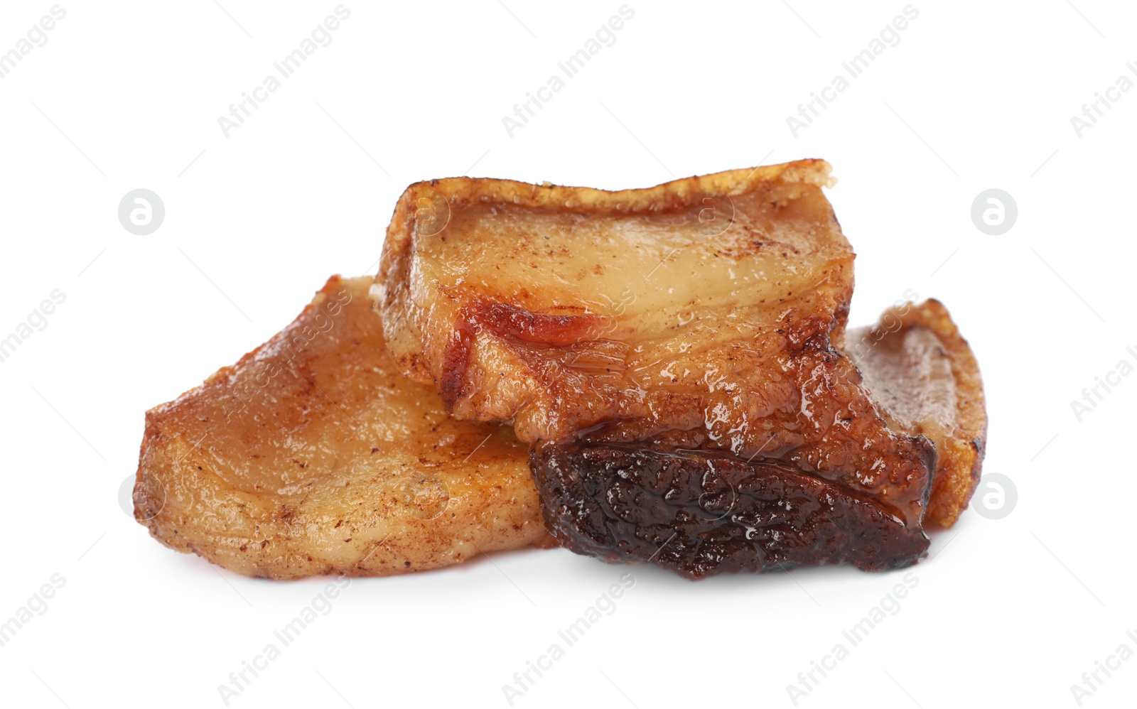 Photo of Tasty fried cracklings on white background. Cooked pork lard