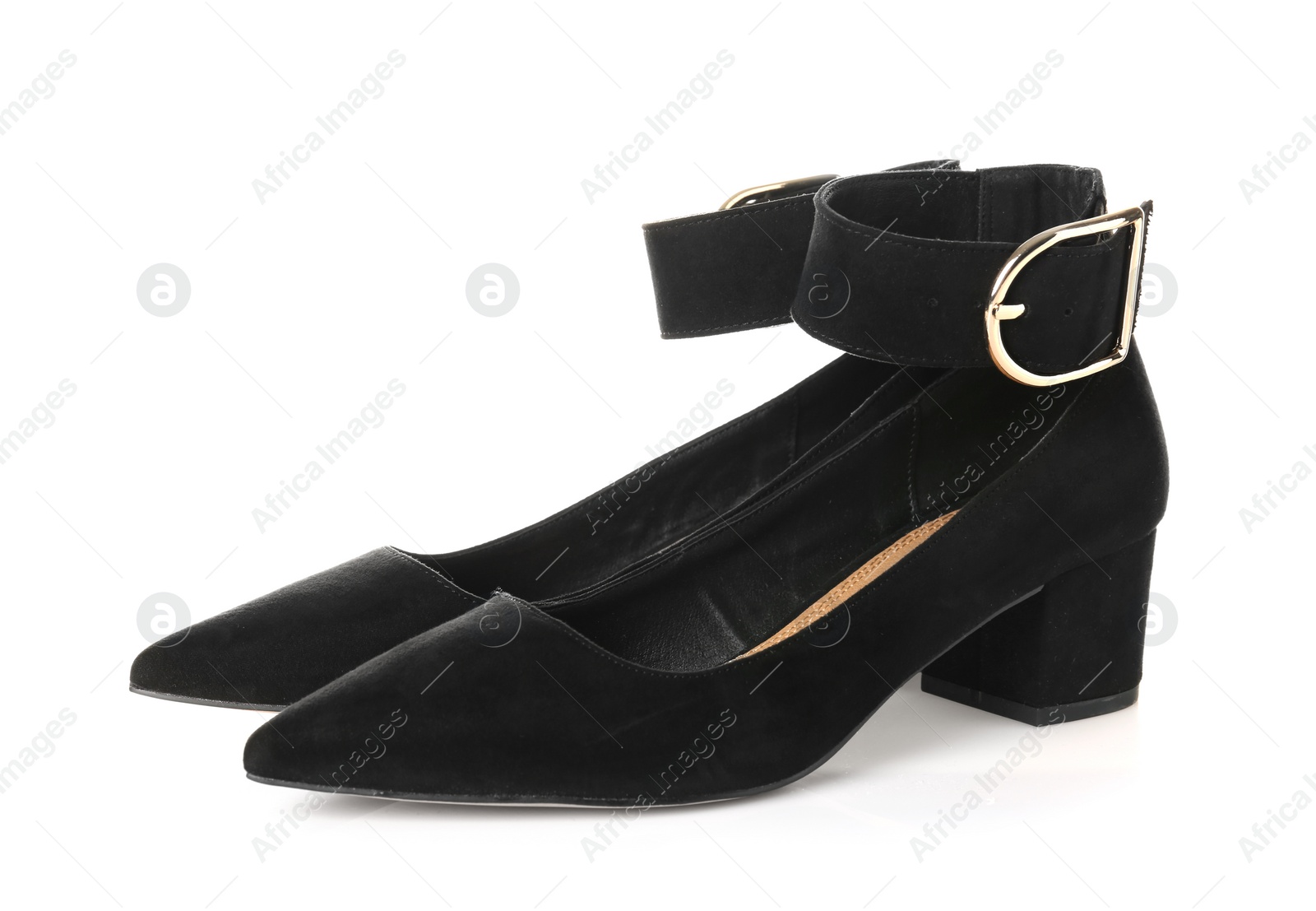 Photo of Pair of female shoes on white background