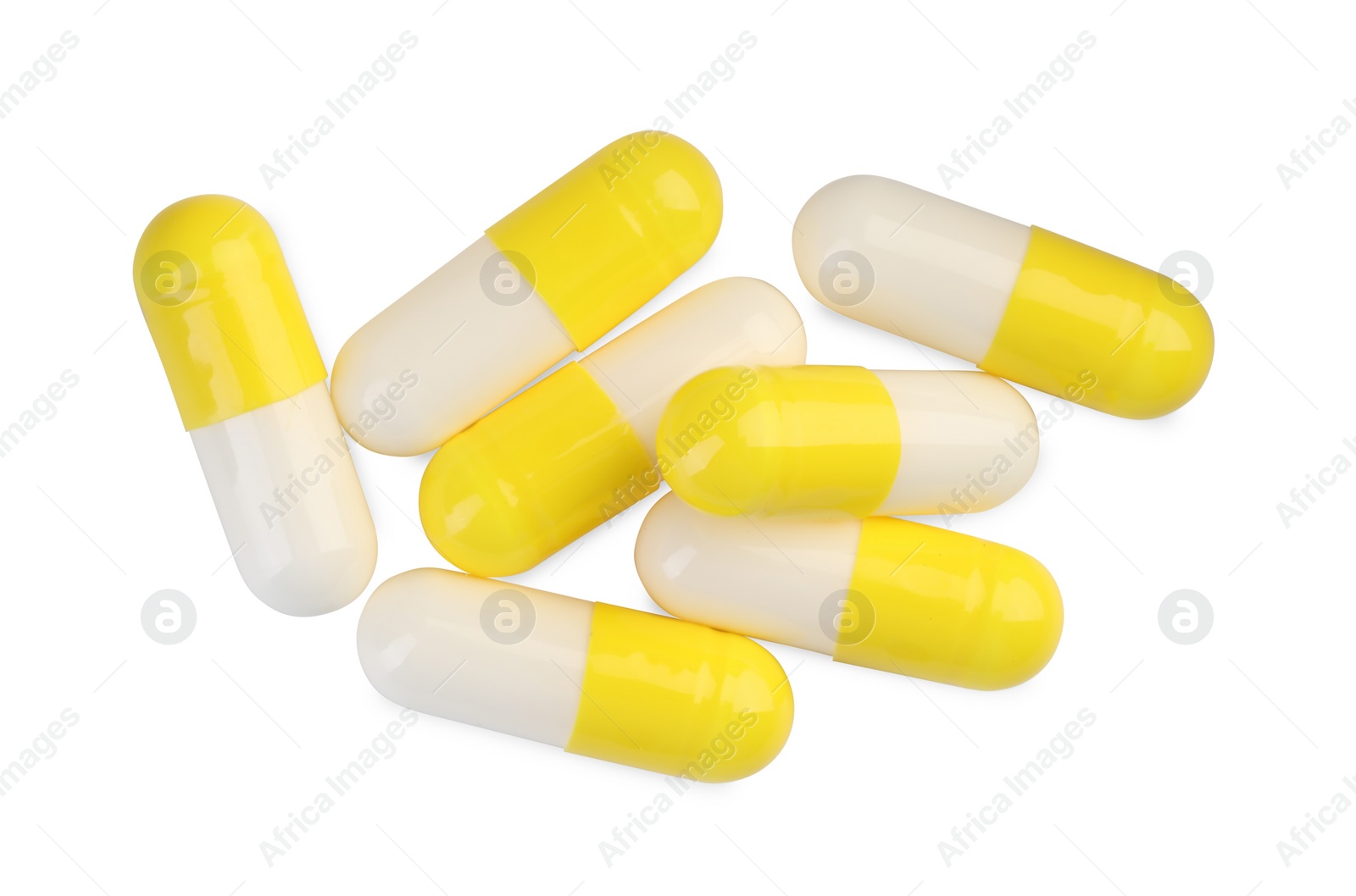 Photo of Many antibiotic pills isolated on white, top view