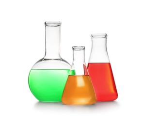 Photo of Laboratory glassware with different samples on white background. Solution chemistry