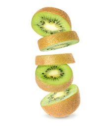 Cut ripe kiwi fruit on white background