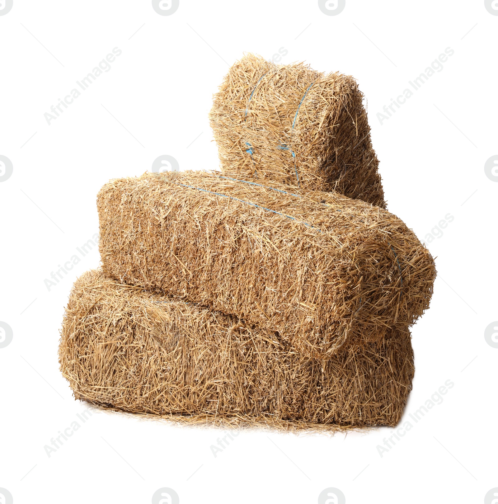 Photo of Bales of dried straw isolated on white