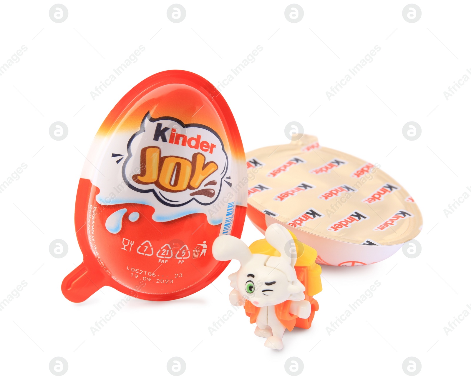 Photo of Slynchev Bryag, Bulgaria - May 24, 2023: Kinder Joy Eggs and toy isolated on white