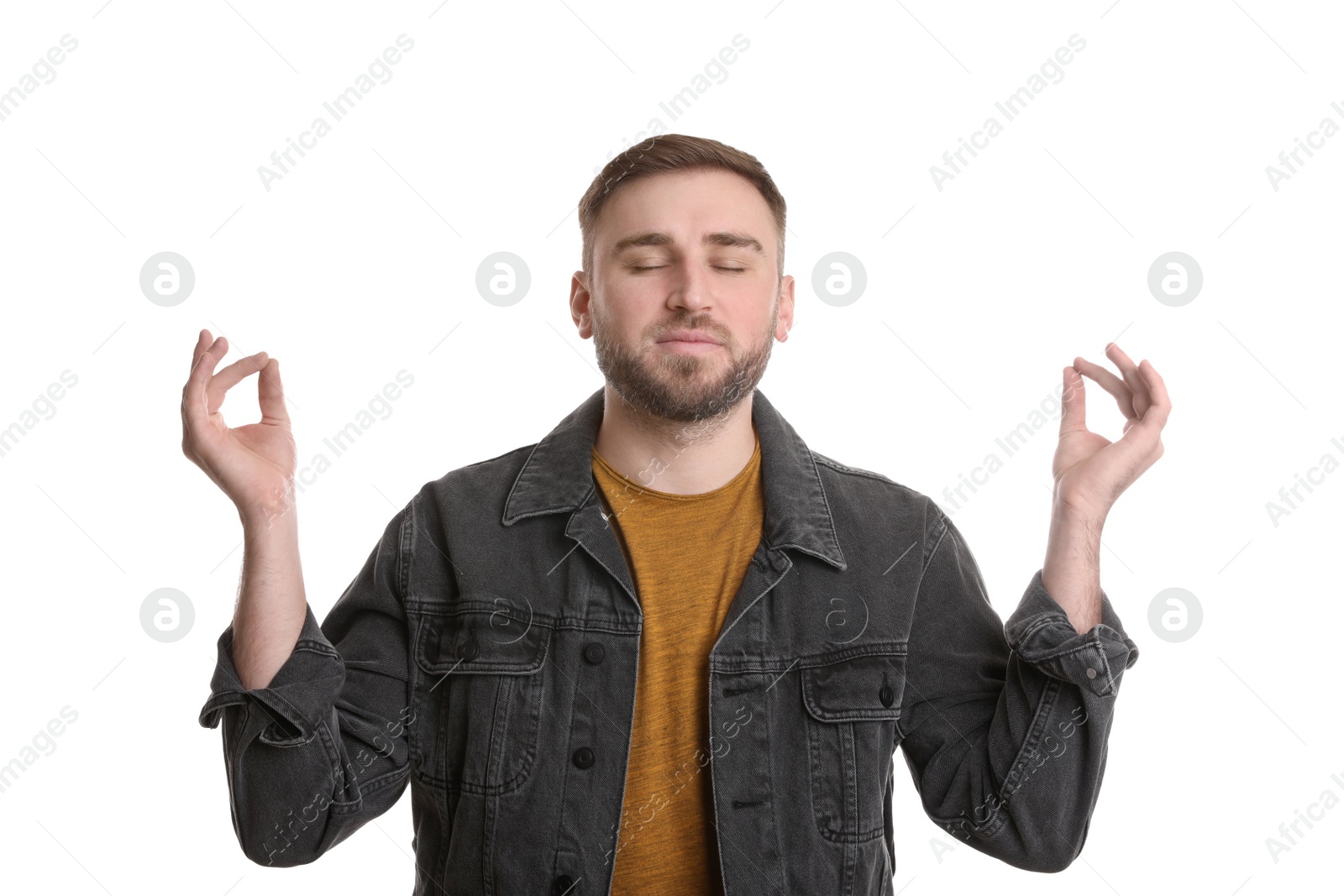 Photo of Young man meditating on white background. Personality concept