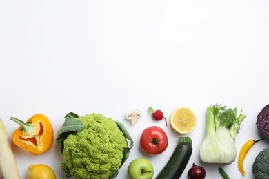Photo of Flat lay composition with fresh ripe vegetables and fruits on white background