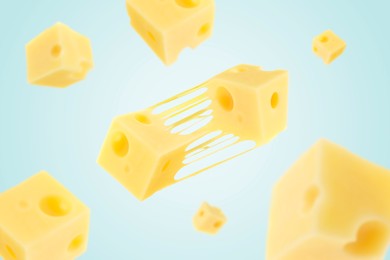 Image of Pieces of cheese falling on light blue background