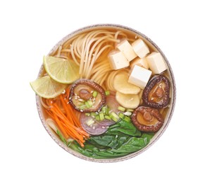 Photo of Bowl of vegetarian ramen isolated on white, top view