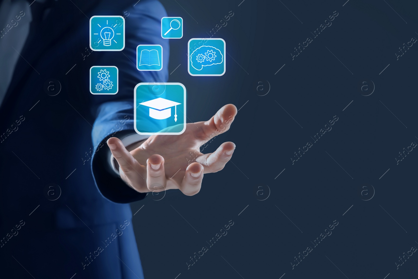 Image of E-learning. Man showing different icons on virtual screen against dark background, closeup. Space for text