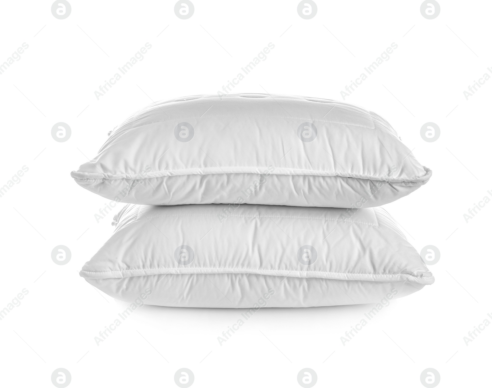 Photo of Clean soft bed pillows on white background