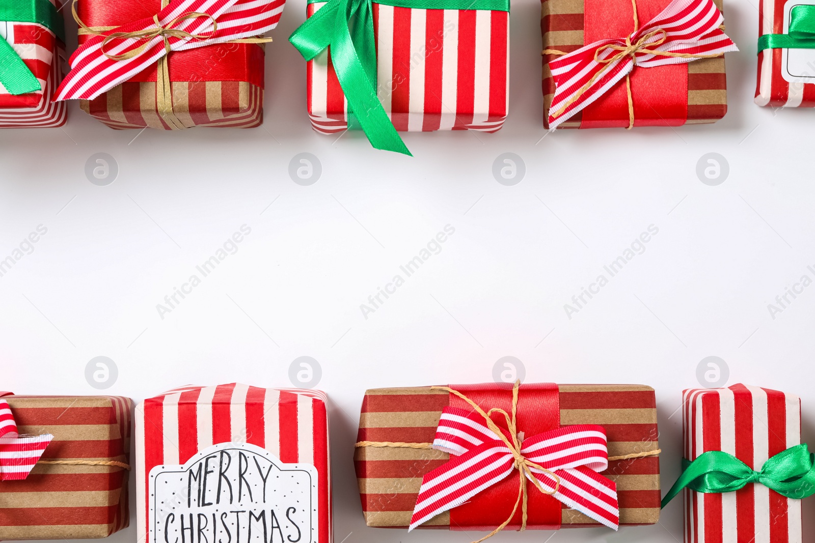 Photo of Different Christmas gift boxes on white background, flat lay. Space for text