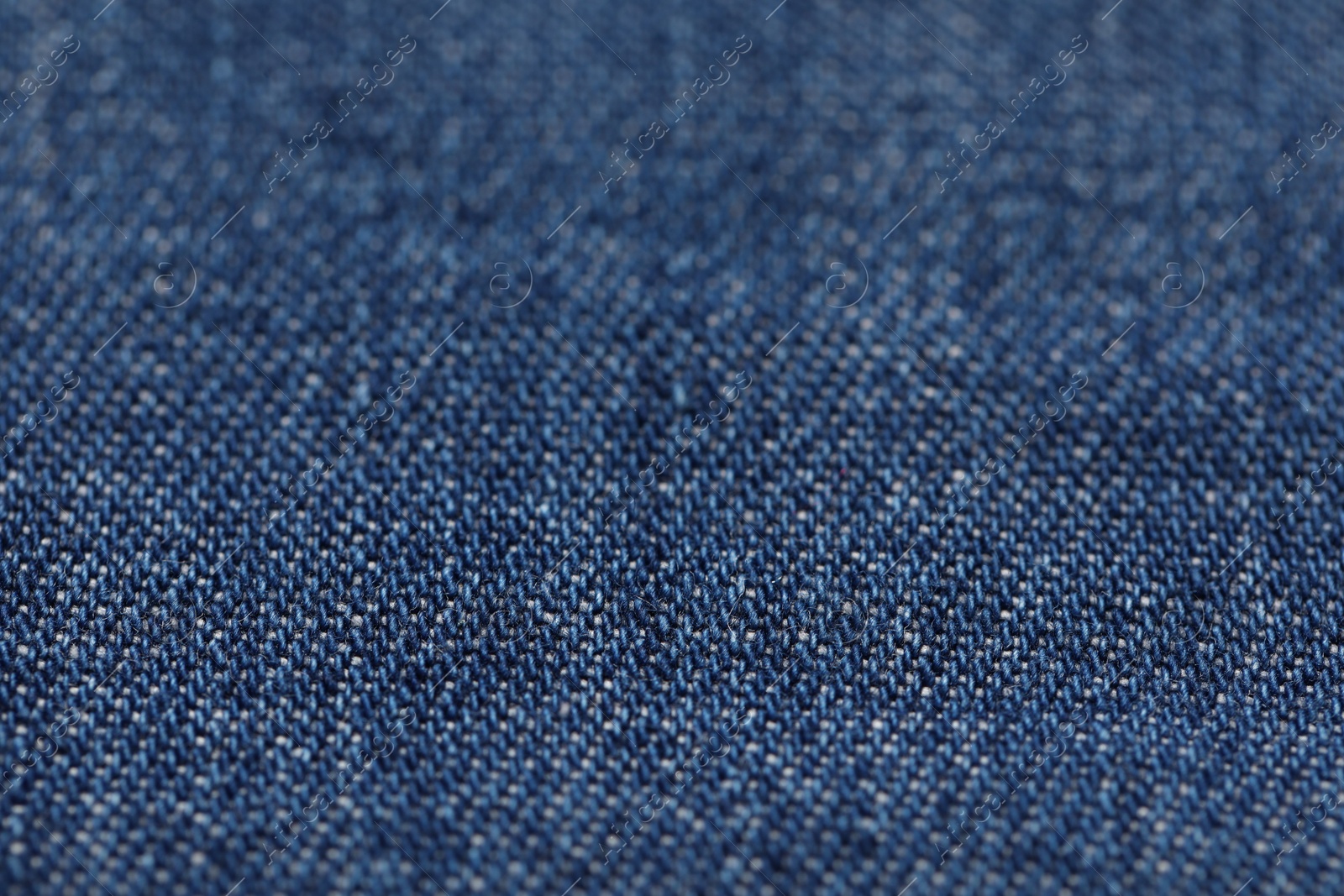 Photo of Texture of soft blue fabric as background, closeup