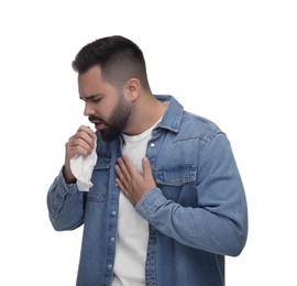Photo of Sick man with tissue coughing on white background