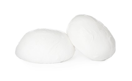 Delicious mozzarella cheese balls on white background