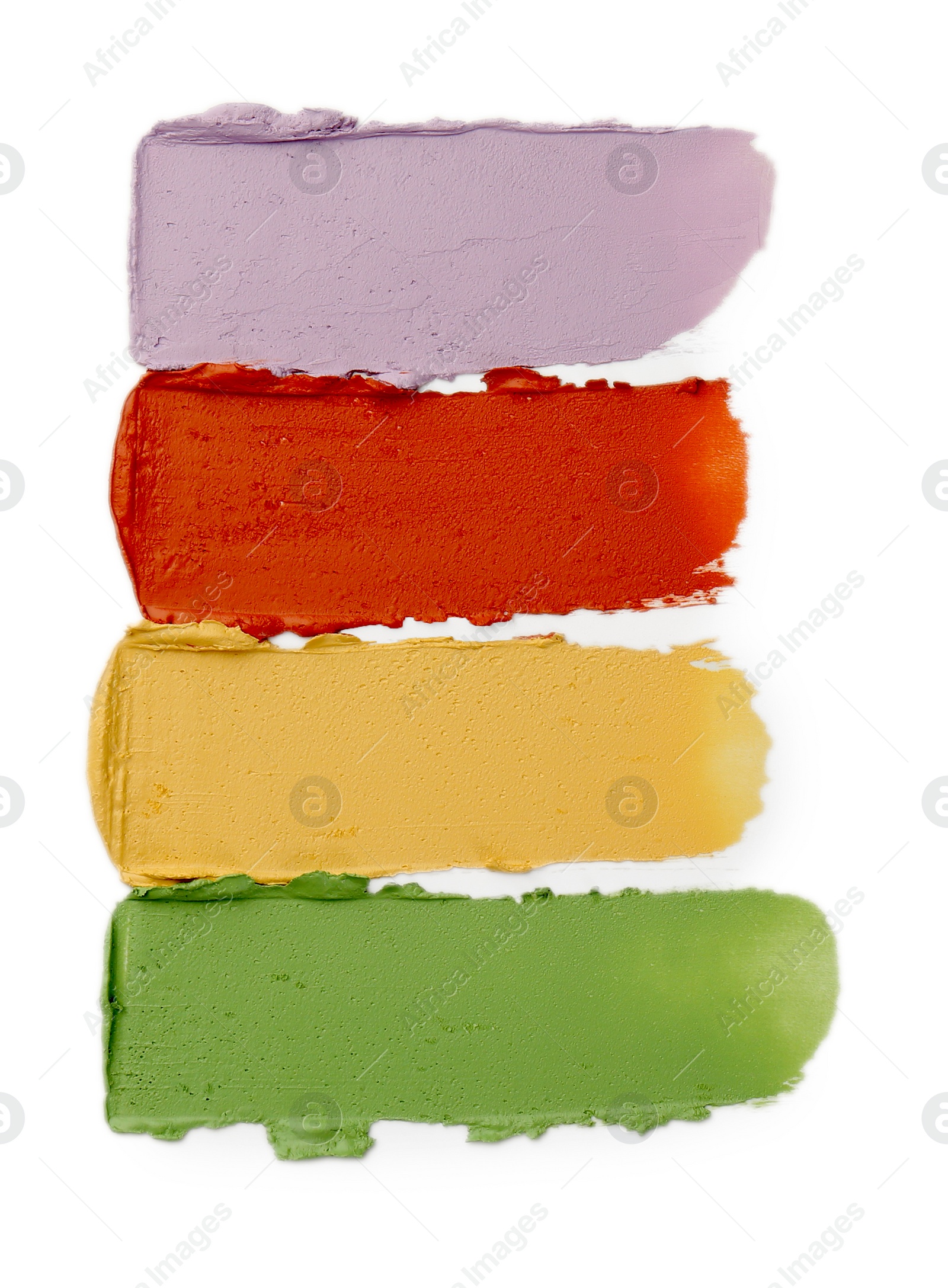 Photo of Samples of color correcting concealers isolated on white, top view