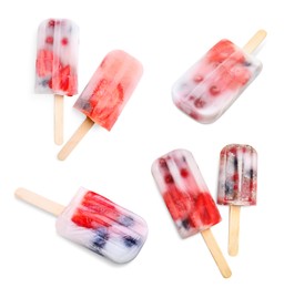 Set with tasty berry ice popsicles on white background