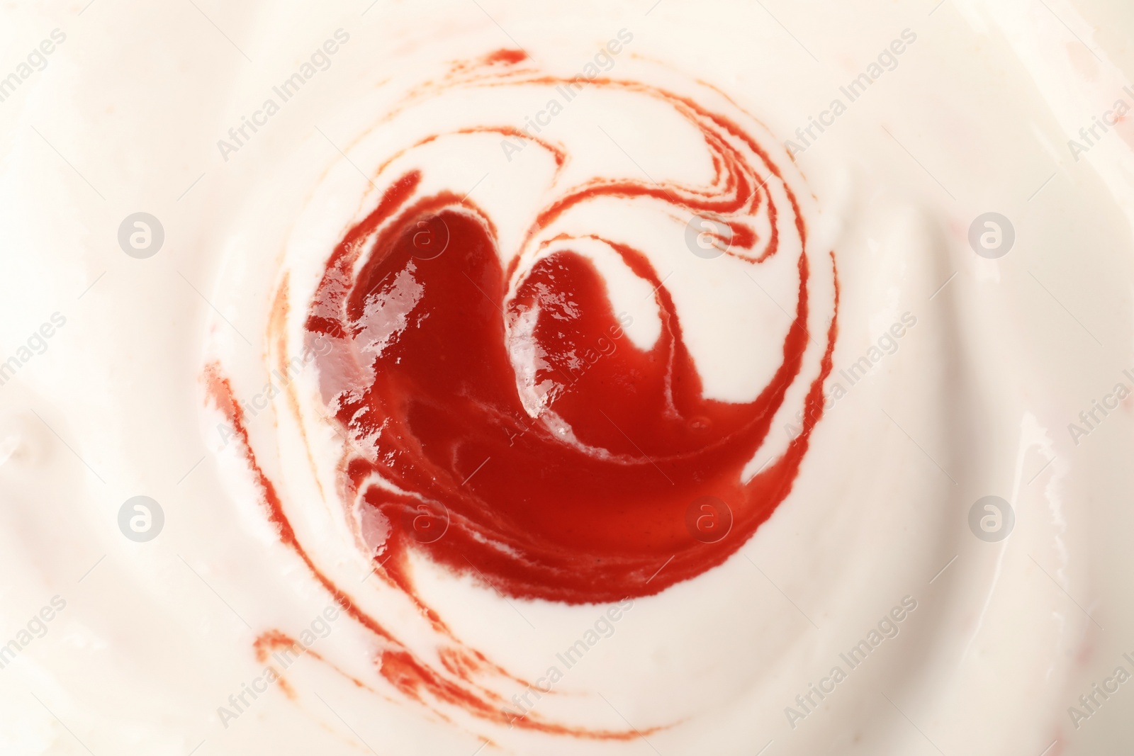 Photo of Tasty yogurt with jam as background, top view