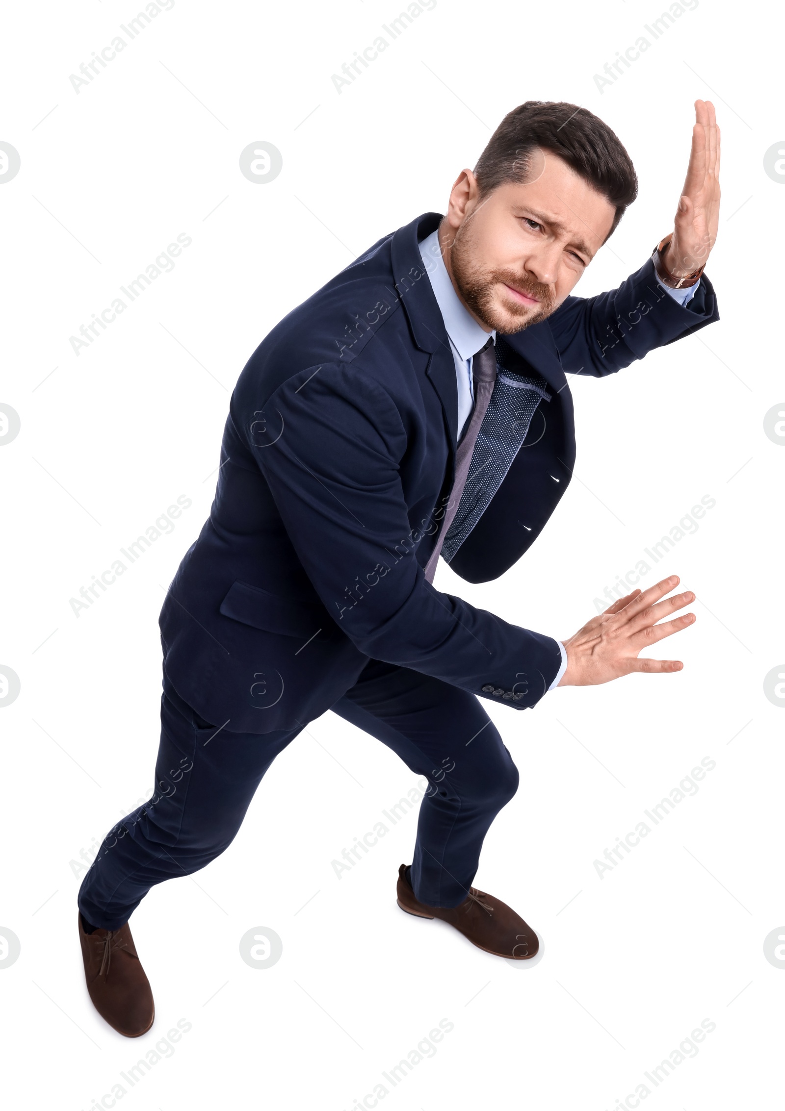 Photo of Handsome bearded businessman in suit on white background, above view