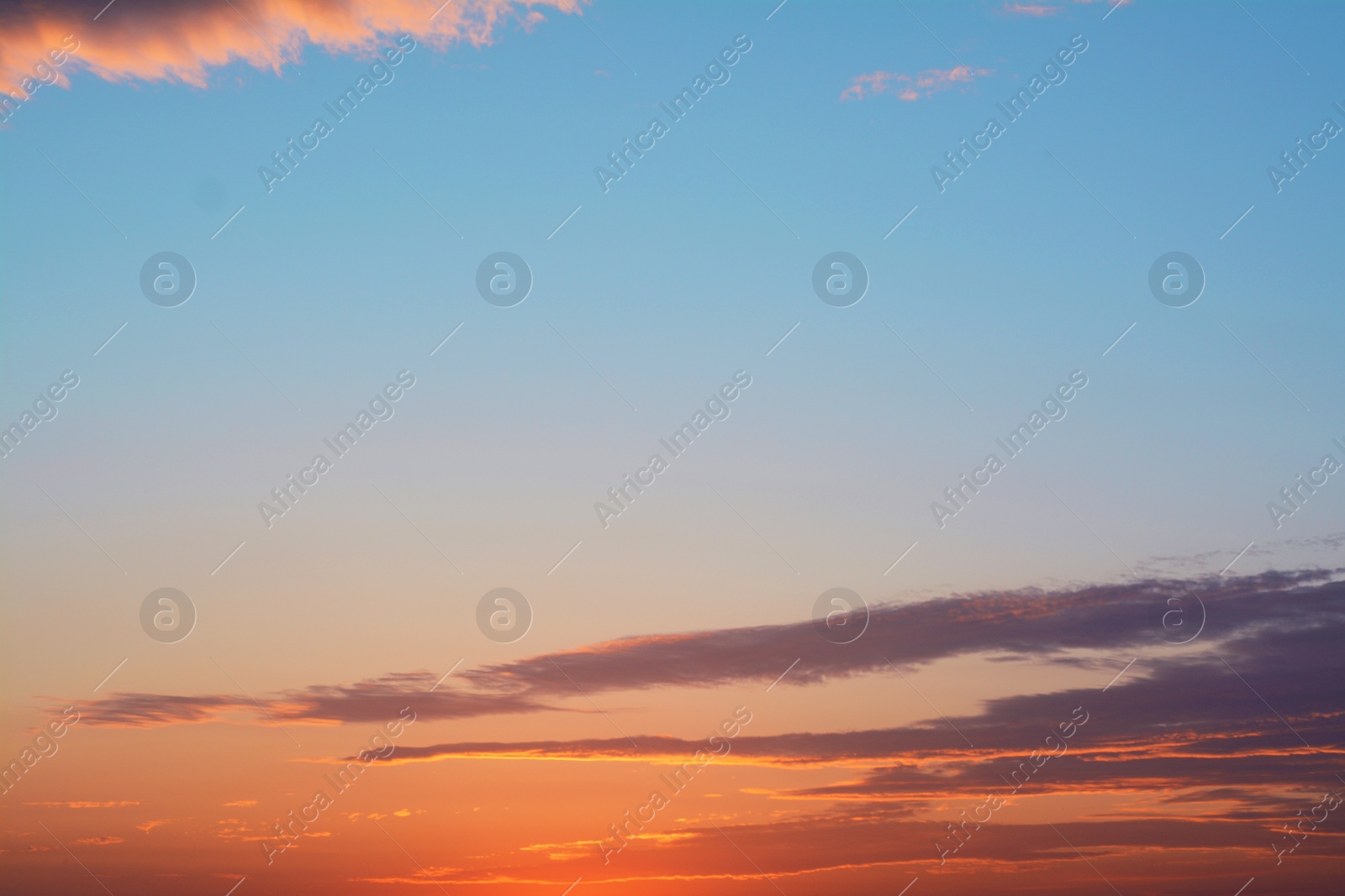 Photo of Beautiful evening sky with clouds at sunset