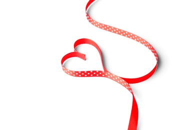 Photo of Heart made of satin ribbon on white background