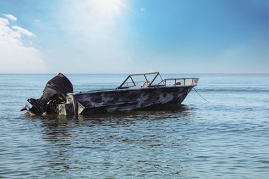 Photo of Motor boat at sea on sunny day