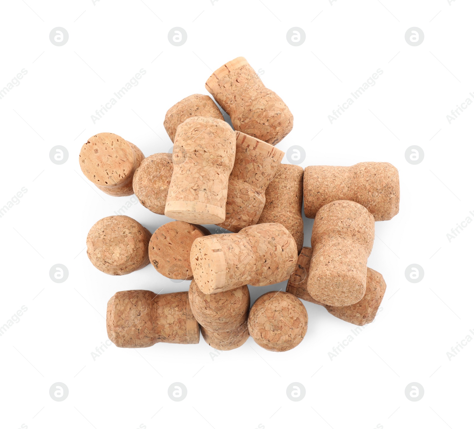 Photo of Heap of sparkling wine corks on white background, top view