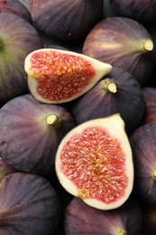 Fresh ripe figs as background, top view