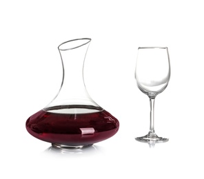 Elegant decanter with red wine and empty glass on white background