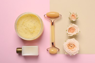 Photo of Skin care products, beautiful roses and face roller on color background