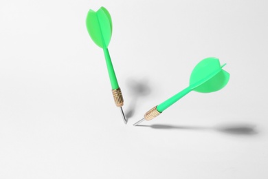 Green dart arrows for game on white background