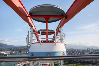 Beautiful large Ferris wheel in city, view from cabin