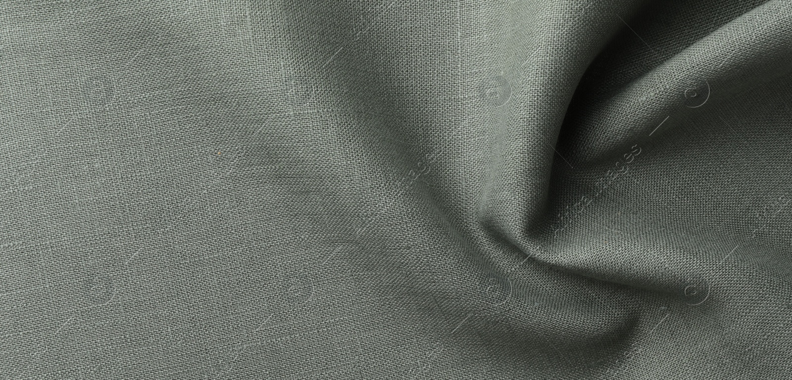 Photo of Texture of grey crumpled fabric as background, top view