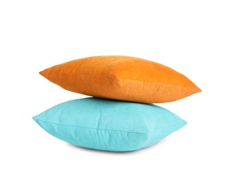 Different colorful decorative pillows on white background