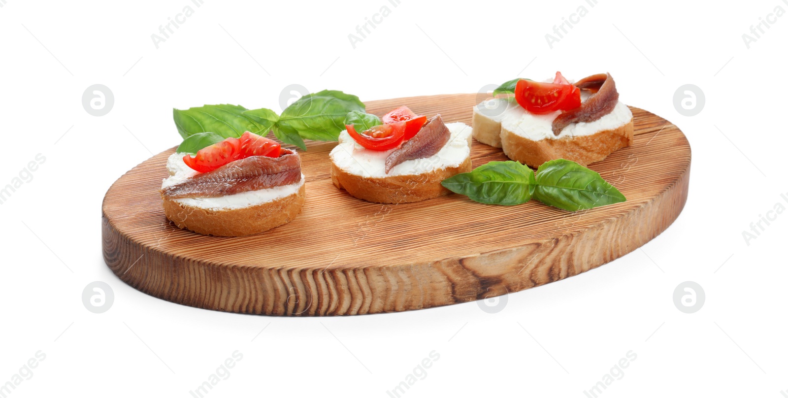 Photo of Delicious sandwiches with cream cheese, anchovies, tomatoes and basil on white background