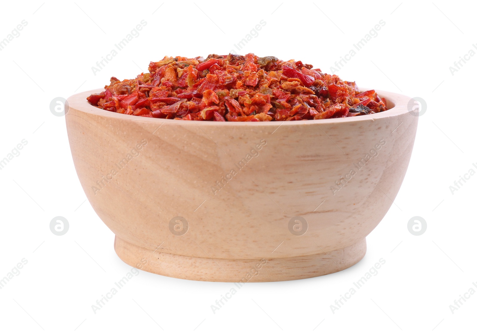 Photo of Aromatic spice. Red chili pepper flakes in bowl isolated on white