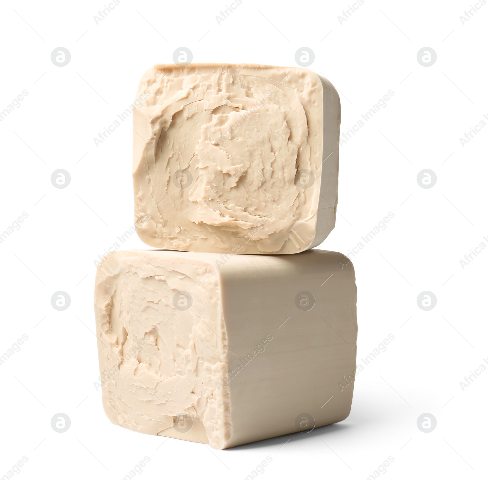 Photo of Blocks of compressed yeast isolated on white