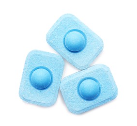 Water softener tablets on white background, top view