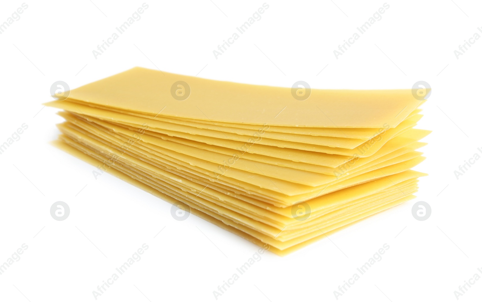 Photo of Stack of uncooked lasagna sheets isolated on white