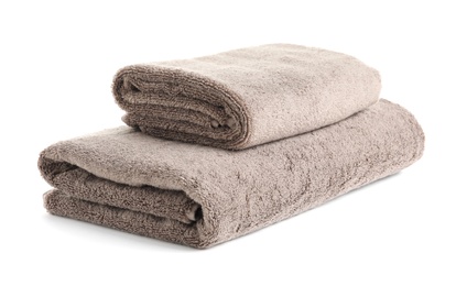 Fresh soft folded towels isolated on white