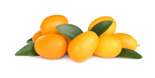 Fresh ripe kumquats with leaves on white background. Exotic fruit