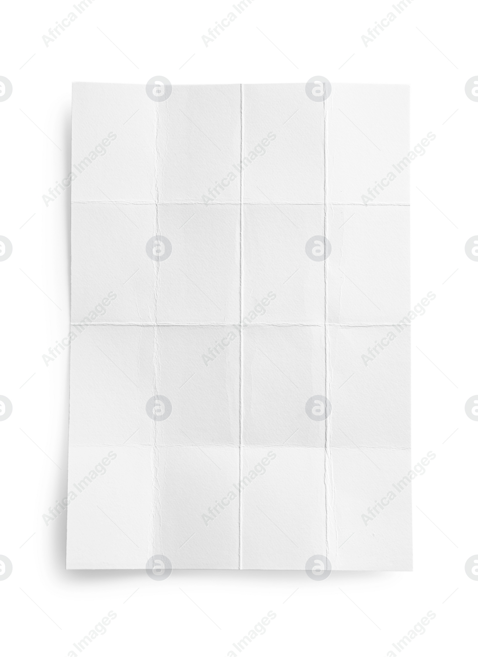 Photo of Blank paper sheet with creases isolated on white, top view