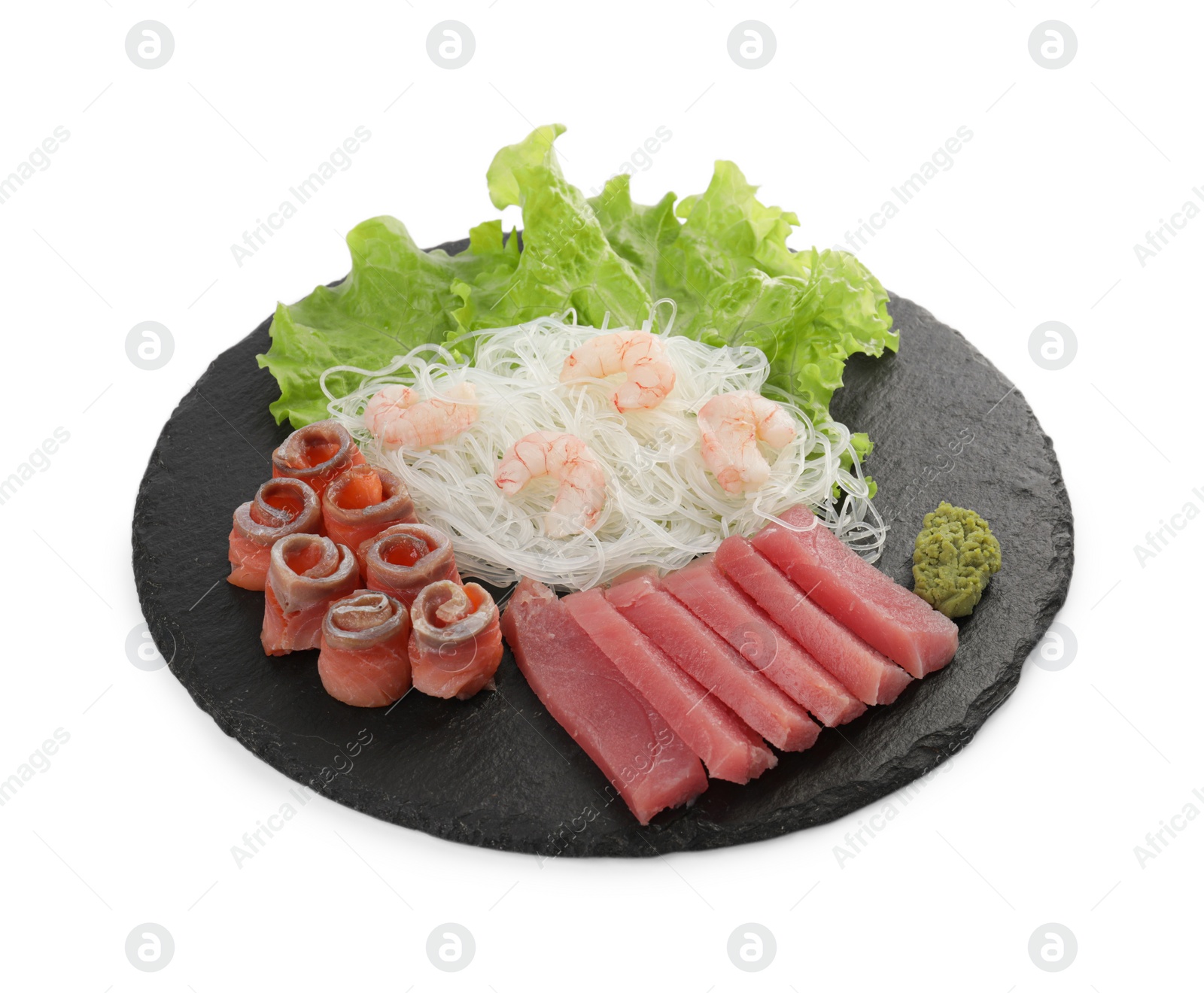 Photo of Sashimi set (raw tuna, salmon slices and shrimps ) served with funchosa, lettuce and vasabi isolated on white