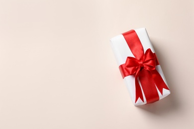 Beautiful gift box on light background, top view