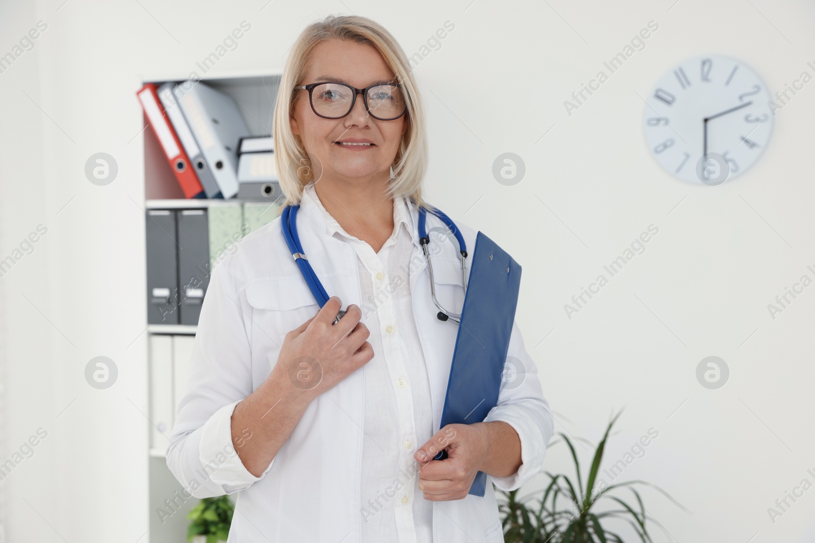 Photo of Professional doctor in uniform with stethoscope in clinic