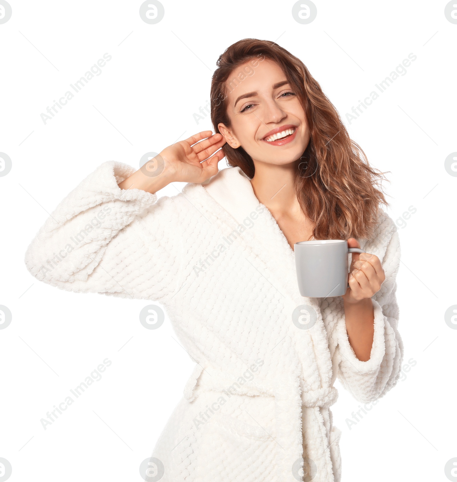 Photo of Beautiful woman with cup of coffee wearing bathrobe on white background